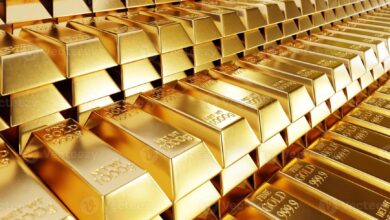 stack of gold bullion bars photo